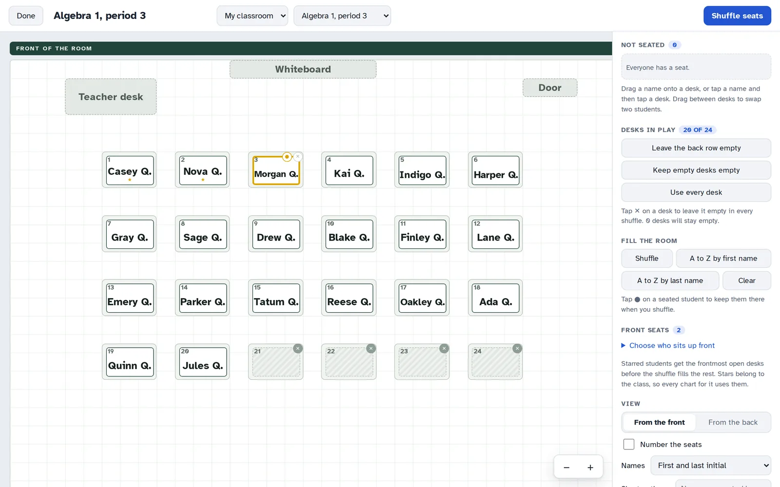 The seating chart editor with numbered desks in rows, students placed in each desk, and the back row left empty.